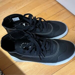 Adidas and Stella McCarthy high tops.